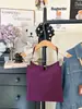 Camisola allure pura y sexy con escote halter, calada y con abalorios, almohadillas en el pecho, diseño ajustado, top único y elegante