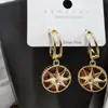 Pendientes elegantes y sencillos de estilo japonés y coreano con forma de estrella de ocho hombres, elegantes pendientes de nicho para mujer, pendientes de alfiler de plata s925 de celebridades de Internet.