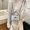 Bolso de mano de alta gama con patrón de rombos transfronterizo para mujer, nuevo bolso exquisito de hombro y cruzado primavera-verano 2026 para la escuela y el trabajo