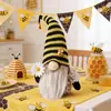 Nuevo Producto Transfronterizo Mingguan: Festival de Abejas Muñeco Tejido Rayado sin Rostro Figura Sosteniendo Flores Muñeca Nórdica Venta al por Mayor