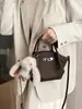 Bolso de Mano Tipo Cubo de Alta Gama Estilo Comercio Exterior para Mujer, Nuevo Bolso de Hombro Casual Vintage Invierno 2026, Bolso Cruzado de Nicho