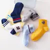 Nuevos Calcetines para Niños 2025 Primavera y Verano Calcetines de Malla Transpirable para Niños Estilo Simple con Letras Calcetines de Media Pantorrilla para Niños Medianos y Grandes