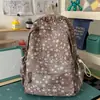 Mochila cielo estrellado azul brumoso suave, estilo coreano suave y linda, con un ambiente dulce y encantador, perfecta para salidas y sesiones de fotos