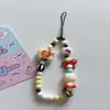 Cadena Original Casera para Teléfono Móvil Ins Dibujos Animados Lindo Hombre Manzana Funda de Teléfono Móvil Correa Colgante de Cámara de Cuentas Hecho a Mano DIY