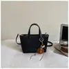 Bolso de Cubo de Mano de Alto Valor para Mujer Otoño 2026 Nuevo Bolso de Hombro Casual Elegante Sensación Relajada Bolso Cruzado Retro