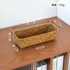 Cesta tejida a mano de hierba para guardar bocadillos, un organizador de escritorio estilo japonés para productos de cuidado de la piel y una cesta de almacenamiento para gabinetes de TV