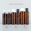 Garrafa lisa do ombro de 100ml120ml150ml Brown com a garrafa vazia rachada do animal de estimação da emulsão do empacotamento cosmético do tampão de Qiuqiu