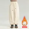 Pantalones de pana forrados de polar para niña 2026 otoño e invierno nuevos pantalones zanahoria versátiles para niños pantalones largos holgados para niñas