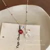 ¡¡¡Súper lindo!!! Collar Colgante Perro Globo M&M Rojo para Mujer, Nuevo Accesorio de Cadena para Suéter de Alta Gama Otoño e Invierno 2025