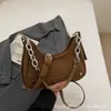 Bolsa de Mão Feminina Fashion 2026 Novo Modelo Versátil de Alta Qualidade Bolsa de Ombro Grande Capacidade Casual para o Dia a Dia Tendência
