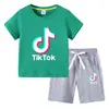Camiseta infantil 2022 TikTok verano nueva ropa infantil de comercio exterior coreana pantalones cortos de manga corta para niños traje de dos piezas