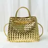 Bolso tote de diseño de nicho de moda, nudo metálico, tejido de cuero, hombro, portátil, gran capacidad, piel de vaca, bolso para mujer
