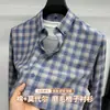 Camisa Masculina de Manga Longa de Algodão Modal Escovado 2026 Outono Nova Camisa Masculina Xadrez Casual para Homens de Meia-Idade