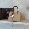 Bolso Pequeño Cuadrado Casual de Nicho Estilo Coreano para Mujer, Nuevo Elegante Bolso de Hombro Cruzado de Alto Valor Primavera 2026