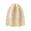 Venta al por mayor de nuevos gorros de punto unisex de cachemira para otoño e invierno, gorros casuales de color liso trenzados cálidos protectores de orejas