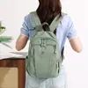 Mochila casual de color sólido, ligera, versátil, transfronteriza, unisex, mochila de viaje simple de gran capacidad, mochila escolar para estudiante
