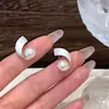 ¡Arco Perla Blanca! Pendientes de botón de plata S925 con aguja, estilo coreano, arco, perla artificial, nuevo estilo popular 2026, pendientes simples para mujeres, para ir al trabajo