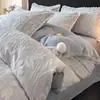 Colección de otoño e invierno: juego de ropa de cama de terciopelo de leche de cuatro piezas, funda de edredón de forro polar coral gruesa por ambos lados y juego de sábanas de franela de tres piezas