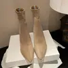 Primeiro encontro com a sensação de pisar na bosta! Botas curtas femininas estilo Martin, de bico fino, salto alto grosso, elásticas e justas, para o Outono/Inverno 2026, versáteis