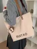 Bolsas de Mujer Transfronterizas 2026 Nuevas Bolsas de Lona de Venta Caliente Bolso de Hombro Versátil Casual de Gran Capacidad Bolso Tote de Moda para Viajar