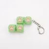 Chaveiro Botão Luminoso de Patinha de Gato Chave de Teclado Switch Tecla de Teclado Brinquedo Descompressão Pingente de Bolsa Chaveiro