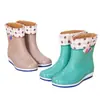 Botas de lluvia nuevas Zapatos impermeables para mujer Zapatos de goma Botas de lluvia de moda cálidas para mujer de altura media para adulto Antideslizantes para cocina trabajo Botas de lluvia