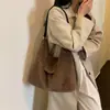 Bolsa Fofa de Grande Capacidade Outono e Inverno 2026 Nova Bolsa de Ombro Versátil para o Dia a Dia Feminina Bolsa Peluda Bolsa Tote