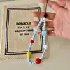Cadena para teléfono móvil al por mayor para mujer, nueva, con colgante de corazón, cordón de cadena para teléfono móvil, con cuentas, linda cadena de cámara ccd