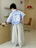 Camisa de Rayas Finas para Niños 2026 Verano Nuevo Diseño de Panda Casual Transpirable 100% Algodón para Niños Mayores