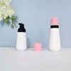 En stock botella cónica blanca de espuma de 60 ml, botella espumadora de PET para mousse de 100 ml, dispensador portátil de espuma facial