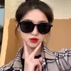 Estilo de celebridad de internet ins gafas de sol para mujer estilo coreano de moda para cara grande que adelgazan versátiles protección solar a prueba de UV gafas de sol color té de leche para hombre