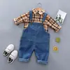 Ropa nueva de primavera para niños coreanos, traje infantil para hombre y mujer, camisa a cuadros con tirantes, pantalones con tirantes, conjunto infantil de dos piezas