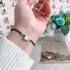 Graduación en tierra Cuerda de Mano de Loto Caperucita Roja Misma Cuerda Roja Tejida Pulsera de Pareja Novia Novia Regalo Pulsera