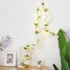 Nueva lámpara LED de alambre de cobre de ratán de flor de cerezo transfronteriza Lámpara decorativa de hoja verde para el hogar nórdico Guirnalda de luces de colores Foto Carril