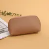 Bolsa de Cosméticos de Couro Dupla Face Transfronteiriça, Bolsa de Armazenamento de Grande Capacidade Cor Sólida, Bolsa Concha Portátil de Couro, Atacado à Prova d'Água e Resistente ao Desgaste