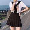 Nova Saia Plissada de Verão Slim Fit Antiderrapante Curta Saia Evasê Estilo Japonês Estilo Universitário Cor Sólida Saia de Meio Comprimento para Menina