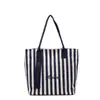 Bolsa de Lona Rayada de Venta Caliente Transfronteriza Nueva para Mujer Bolso Tote de Clase de Gran Capacidad Bolso Tote de Hombro Estilo Coreano para Viajes al Trabajo