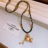 Collar de cuentas de Ojo de Tigre Estilo Vintage para Mujer, Cadena para Suéter, Accesorio de Lujo Ligero de Gama Alta
