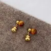 Pendientes de Ojo de Tigre Maillard Otoño e Invierno para Mujer, Pendientes de Botón Elegantes con un Toque de Lujo, Lujo Ligero, Nuevos Accesorios Populares para Orejas 2026