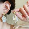 Pendientes de mariposa de estilo coreano con aguja plateada, nicho de alta gama, perla de imitación, pendientes sencillos de diamantes completos, pendientes de borla largos.