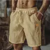 Nuevos pantalones cortos de algodón lino cuero cordón cintura elástica pierna recta color liso transpirables diarios playa cinco pantalones casuales