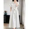 Elegancia femenina transfronteriza, vestido largo a rayas estilo camisa holgado con cinturón, versión coreana del vestido
