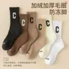Calcetines para mujer engrosados con forro de felpa calcetines de rizo calcetines de tubo cálidos de invierno absorbentes de sudor transpirables color liso calcetines con base de toalla moda
