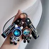 Fuyuan Llavero de Conejo Viajero Espacial Personalizado Moderno y Genial Colgante de Llavero de Goma Suave de Astronauta Colgante Lindo para Bolsa