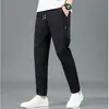 Pantalones Deportivos Transpirables Finos de Seda de Hielo Versátiles de Moda para Hombre en Verano para Hombres Jóvenes Rectos Ajustados con Cordón Casuales Largos
