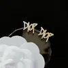 Pendientes de alta calidad para todo tipo de atuendos, pendientes de moda para hombres y mujeres, letras de pedrería, todo a juego, pasador de plata s925, accesorios de aleación