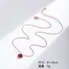 Collar de trébol de cuatro hojas para mujer, lujo ligero, diseño de nicho, colgante rojo, cadena para la clavícula, de alta gama, moderno, versátil