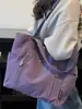 Bolsa Feminina de Grande Capacidade Cor Lisa 2025 Inverno Nova Estilo Coreano Simples Bolsa Tote para Exterior Bolsa de Ombro de Alto Valor para o Dia a Dia