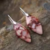 Nuevos pendientes colgantes de hojas de piedra natural bohemios europeos y americanos de moda, joyería retro de estación independiente transfronteriza.