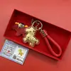 Pingente Pequeno Cavalo Chaveiro Conjunto Caixa de Presente com Pingente de Bolsa Dourada Decoração Atacado para Promoção